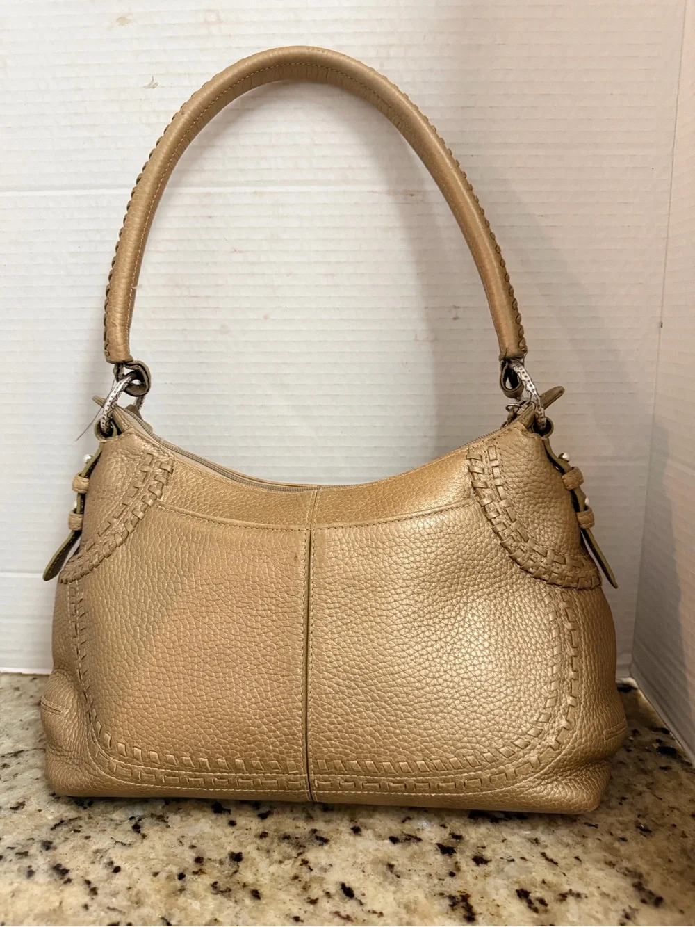 Brighton Gold Pebbled Leather Shoulder Bag with Tassel Accent
